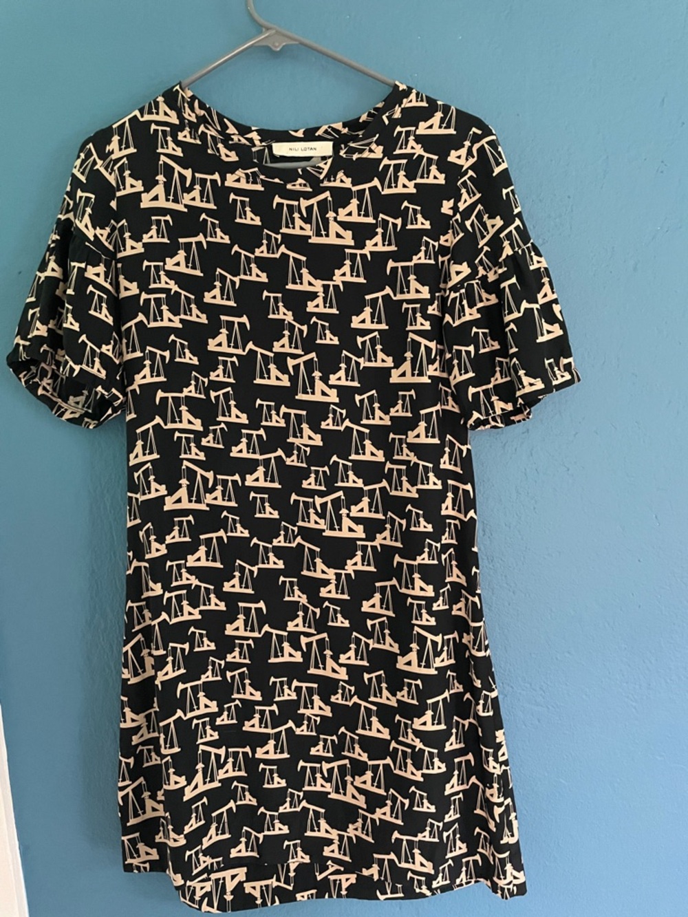 Lili Lotan black with gold pattern silk dress. Gently belted sleeves.  Size XS